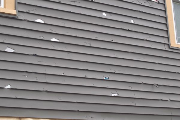 Damaged Siding Replacement in Red Oak