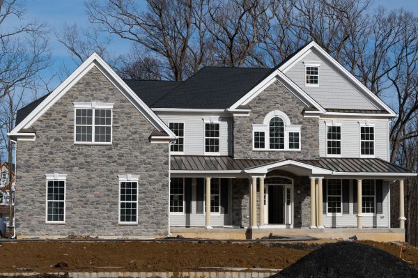 Facade Cladding Installation in Red Oak